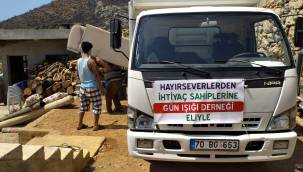 Karaman Günışığı Derneği, yangın mağduru ailenin yaralarını sardı